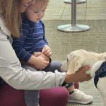 picture of puppy and toddler